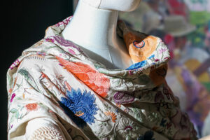 Exhibit of antique shawls talks international trade