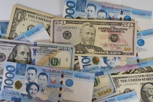 Peso extends slump vs dollar as oil prices surge