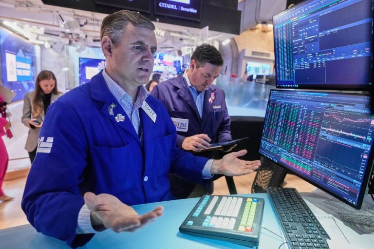 Wall Street gains ground amid steady flow of earnings reports, upbeat economic updates